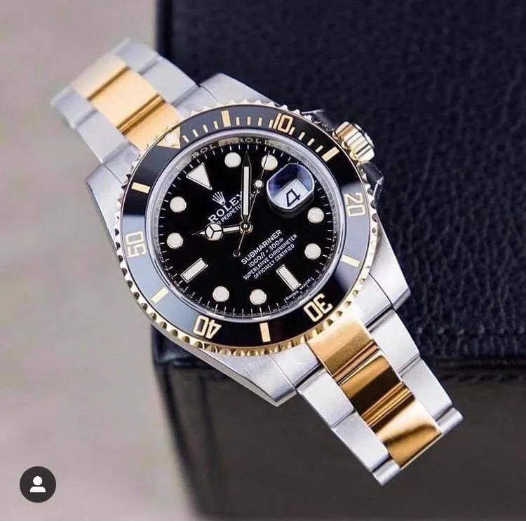 ساعة rolex باللون الذهبي والأسود + البوكس الأصلي 2